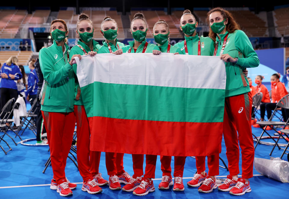 Team Bulgaria (gymnastics) poses with coaches