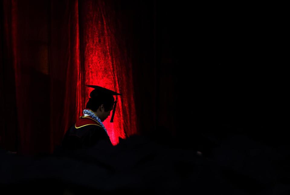 A USC student waits to have their name called during graduation from Viterbi School