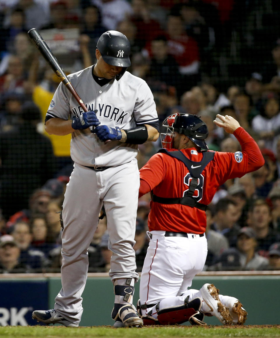 New York Yankees' Gary Sanchez reacts after striking out against the Boston Red Sox during the third inning of Game 1 of a baseball American League Division Series on Friday, Oct. 5, 2018, in Boston. (AP Photo/Elise Amendola)