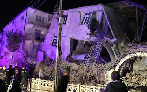 Damaged buildings in Sursuru neighborhood are seen after the quake - Credit: Anadolu Agency