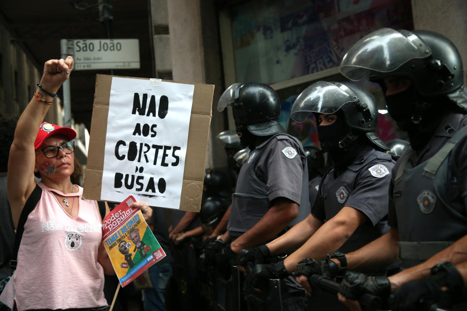 People protest against fare hikes for city buses in Sao Paulo