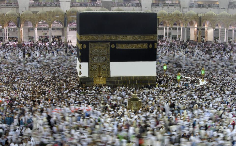 Muslim pilgrims circumambulate around the Kaaba, the cubic building at the Grand Mosque, ahead of the Hajj pilgrimage in the Muslim holy city of Mecca, Saudi Arabia, Wednesday, Aug. 7, 2019. The hajj occurs once a year during the Islamic lunar month of Dhul-Hijja, the 12th and final month of the Islamic calendar year. (AP Photo/Amr Nabil)