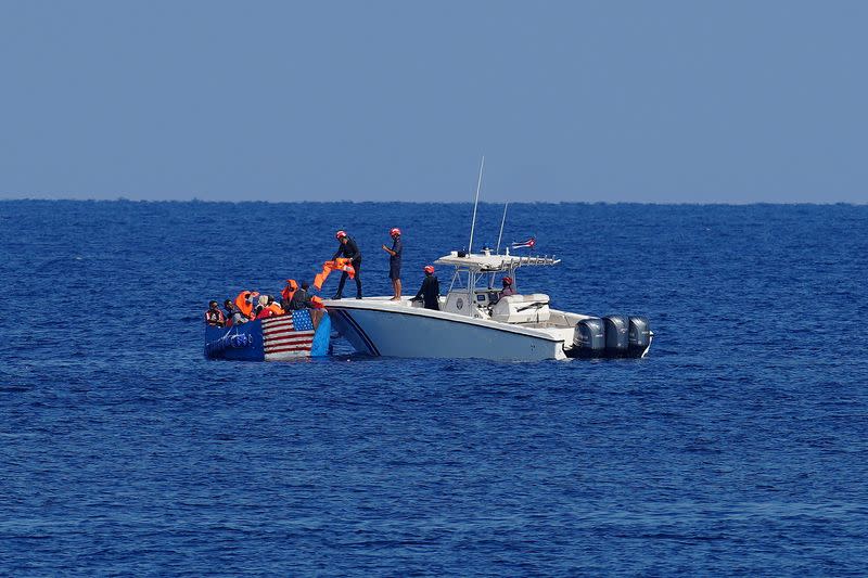 Boat with illegal migrants at the seafront in Havana