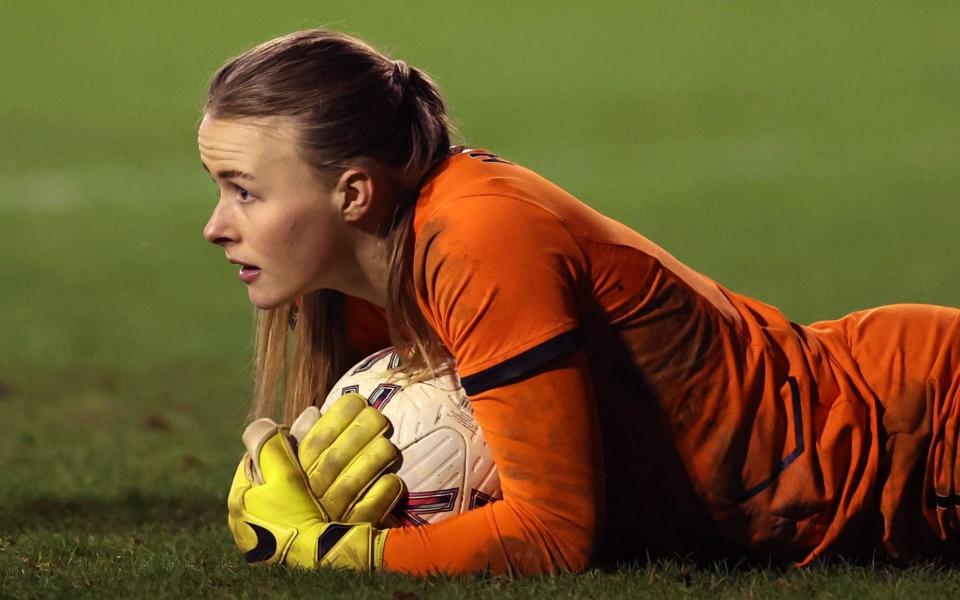 Hannah Hampton lying on the turf - Hannah Hampton returns to Lionesses squad after sorting ‘personal issues’ - Getty Images/Catherine Ivill