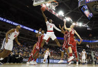 <p>Terence Davis #3 of the Mississippi Rebels drives to the basket against Brady Manek #35 of the Oklahoma Sooners in the first half during the first round of the 2019 NCAA Men’s Basketball Tournament at Colonial Life Arena on March 22, 2019 in Columbia, South Carolina. (Photo by Kevin C. Cox/Getty Images) </p>