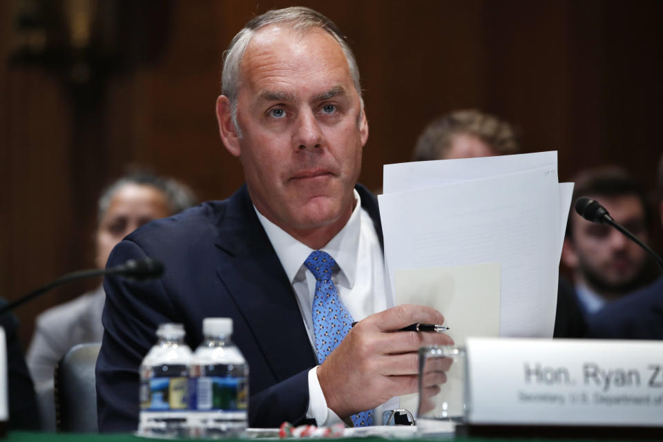 FILE - In this May 10, 2018, file photo, Interior Secretary Ryan Zinke arrives for a Senate Appropriations subcommittee hearing on the FY19 budget on Capitol Hill in Washington. An internal watchdog has cleared IZinke of wrongdoing following a complaint that he redrew the boundaries of a national monument in Utah to benefit a former state lawmaker and political ally. The Interior Department’s office of inspector general says it found no evidence that Zinke gave former state Rep. Mike Noel preferential treatment in shrinking the boundaries of Utah’s Grand Staircase-Escalante National Monument. (AP Photo/Jacquelyn Martin, File)