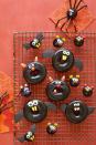 <p>These chocolate-covered Halloween treats double as a<a rel="nofollow noopener" href="https://www.womansday.com/home/crafts-projects/g2490/halloween-kids-crafts/" target="_blank" data-ylk="slk:kid's craft;elm:context_link;itc:0;sec:content-canvas" class="link "> kid's craft</a>.</p><p><strong><a rel="nofollow noopener" href="https://www.womansday.com/food-recipes/food-drinks/a23460042/black-cat-bat-spider-and-mice-doughnuts-recipe/" target="_blank" data-ylk="slk:Get the recipe;elm:context_link;itc:0;sec:content-canvas" class="link ">Get the recipe</a>. </strong></p>