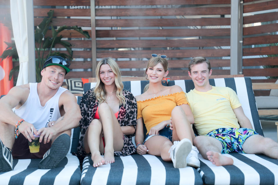 Brittany Creech and her friends sit by the pool at Taco Bell's 'The Bell' hotel in Palm Springs, Calif. on Thursday, August 8, 2019.