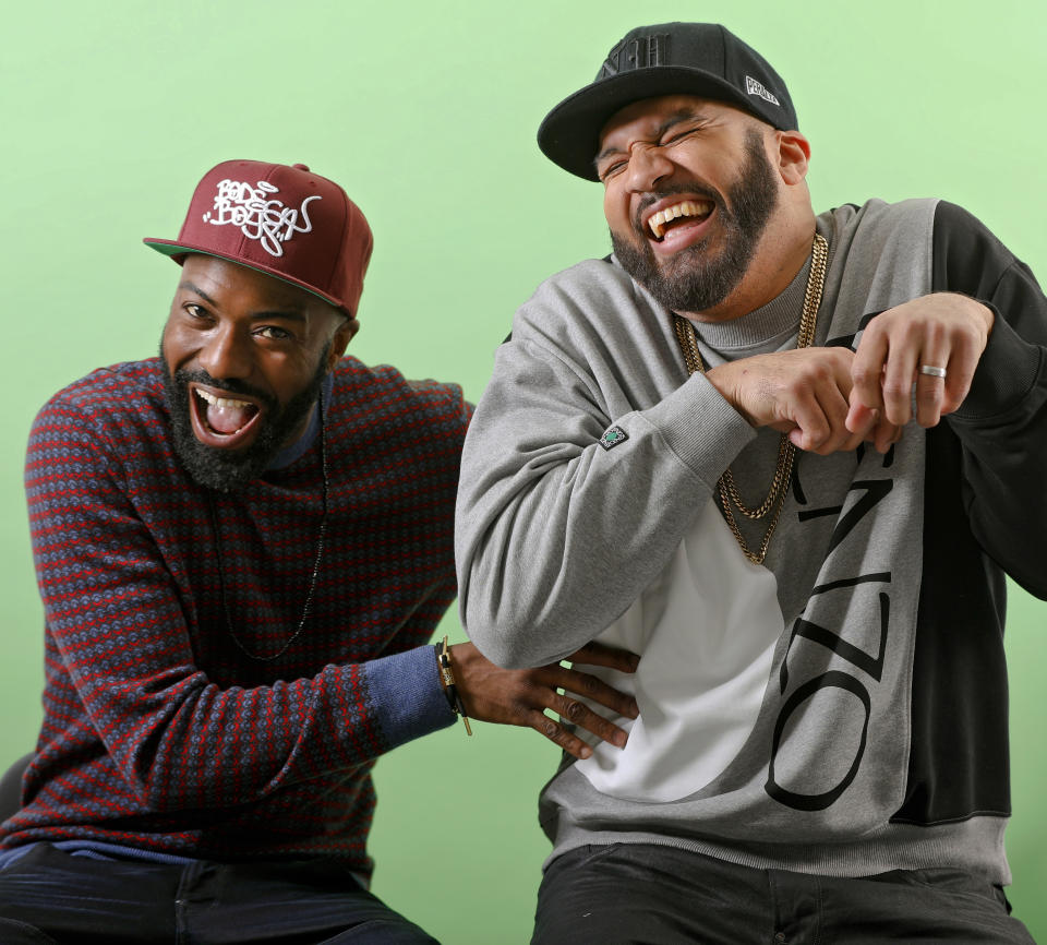 This March 19, 2019 photo shows Daniel Baker, better known as Desus Nice, left, and Joel Martinez, also known as The Kid Mero, during a portrait session in New York. The pair host the late night series "Desus & Mero," on Showtime. (Photo by Brian Ach/Invision/AP)