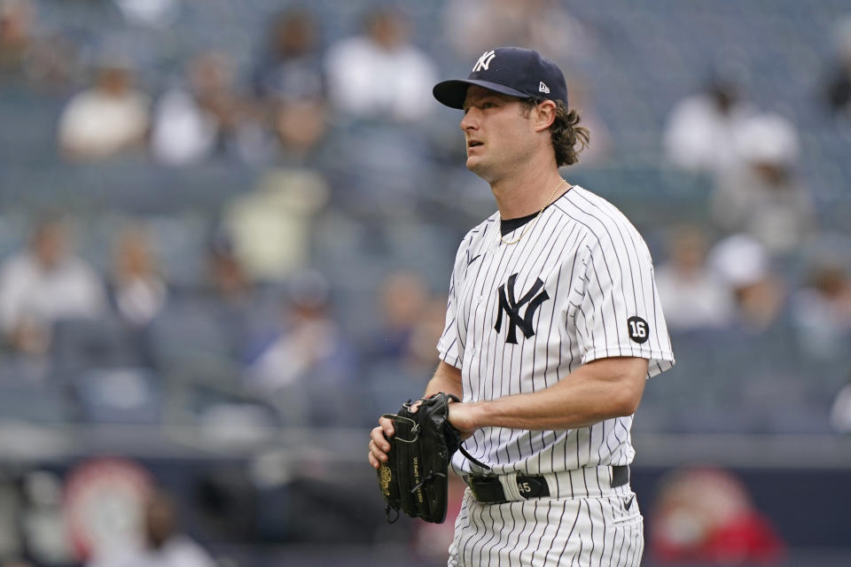 New York Yankees starting pitcher Gerrit Cole (45) reacts heading to the dugout after allowing a two-run home run to Tampa Bay Rays designated hitter Austin Meadows in the fourth inning of a baseball game, Thursday, June 3, 2021, at Yankee Stadium in New York. (AP Photo/Kathy Willens)