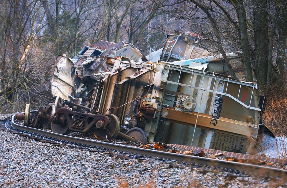 Mangled rail cars are shown Thursday after a train derailment the night before off Tommytown Road near Sharpsburg. The train was operated by Norfolk Southern.