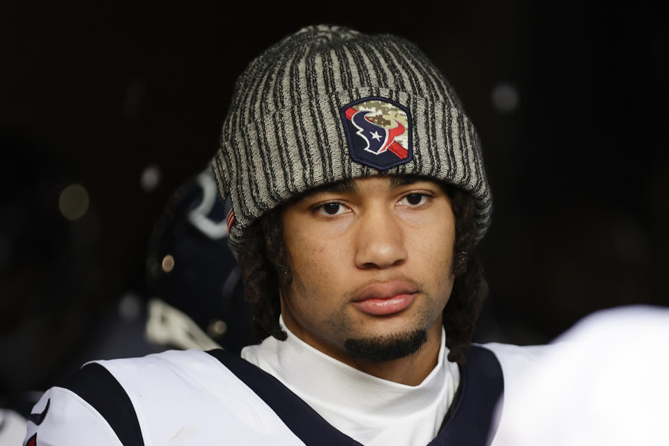 Houston Texans quarterback C.J. Stroud, left, prepares to take the field against the New York Jets in an NFL football game, Sunday, Dec. 10, 2023, in East Rutherford, N.J. (AP Photo/Adam Hunger)