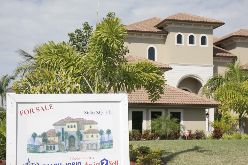 McMansion for sale sign. (Photo by: Jeffrey Greenberg/Universal Images Group via Getty Images)