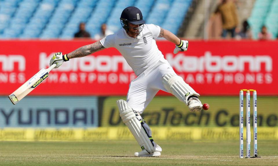<span>England's Ben Stokes – a centurion on his last Test visit to Rajkot – kicks the ball away from the stumps at the ground in 2016.</span><span>Photograph: Amit Dave/Reuters</span>