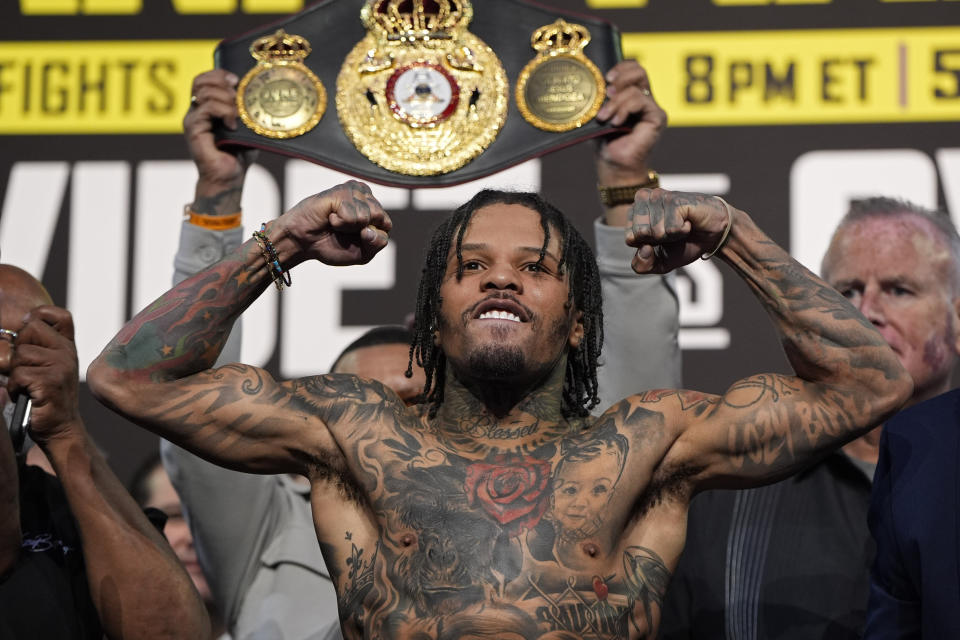 Gervonta Davis poses on the scale during a weigh-in Friday, June 14, 2024, in Las Vegas. Davis is scheduled to fight Frank Martin in a WBA lightweight championship fight Saturday in Las Vegas. (AP Photo/John Locher)