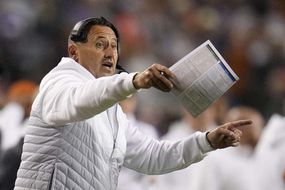 FILE - Texas head coach Steve Sarkisian talks to his team during the first half of an NCAA college football game against TCU, Saturday, Nov. 11, 2023, in Fort Worth, Texas. No. 2 Washington and No. 3 Longhorns meet Monday, Jan. 1, 2024 in the Sugar Bowl in a matchup of offenses known for aggressive and creative play calling. (AP Photo/Julio Cortez, File)