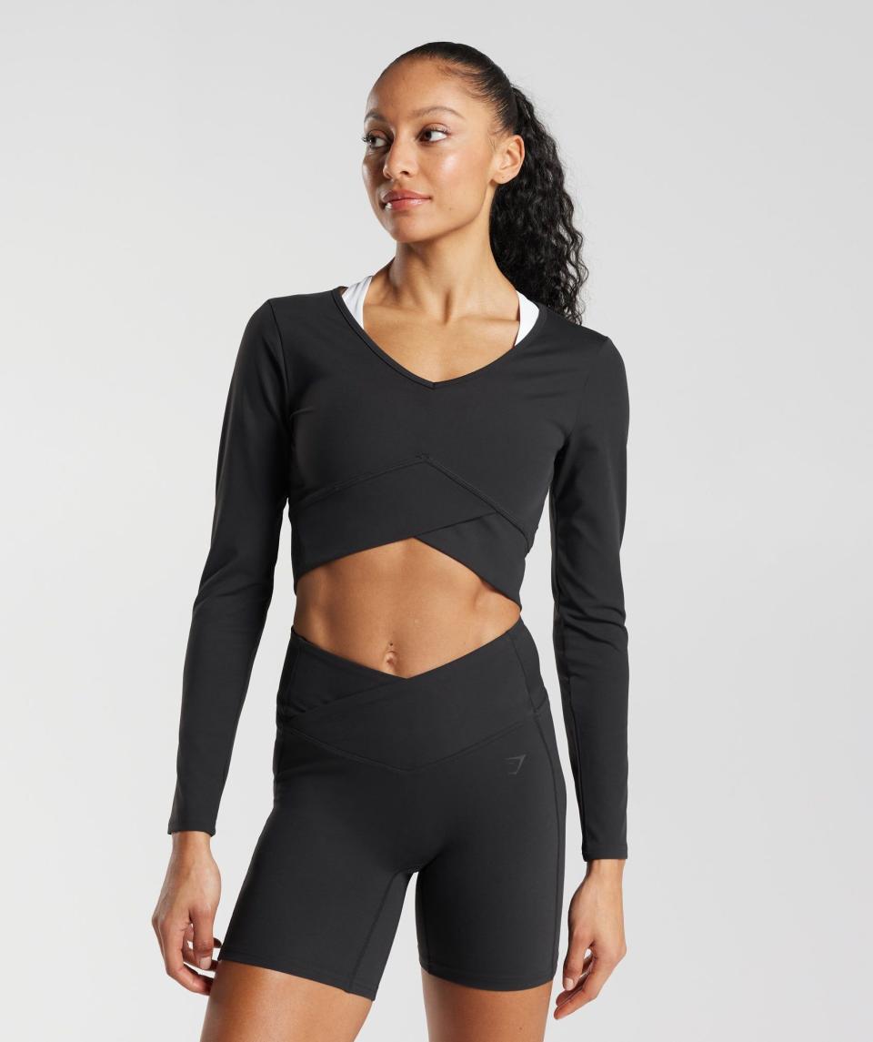 <p><a href="https://go.redirectingat.com?id=74968X1596630&url=https%3A%2F%2Fwww.gymshark.com%2Fproducts%2Fgymshark-crossover-long-sleeve-crop-top-black-ss23&sref=https%3A%2F%2Fwww.harpersbazaar.com%2Ffashion%2Ftrends%2Fa45457105%2Fblack-friday-cyber-monday-fashion-deals-2023%2F" rel="nofollow noopener" target="_blank" data-ylk="slk:Shop Now;elm:context_link;itc:0;sec:content-canvas" class="link ">Shop Now</a></p><p>Crossover Long Sleeve Crop Top Black</p><p>gymshark.com</p><p>$15.20</p>