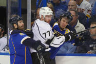 ST. LOUIS, MO - APRIL 30: Jeff Carter #77 of the Los Angeles Kings checks Alexander Steen #20 of the St. Louis Blues into the boards as Barret Jackman #5 also of the St. Louis Blues defends in Game Two of the Western Conference Semifinals during the 2012 NHL Stanley Cup Playoffs at the Scottrade Center on April 30, 2012 in St. Louis, Missouri. (Photo by Dilip Vishwanat/Getty Images)