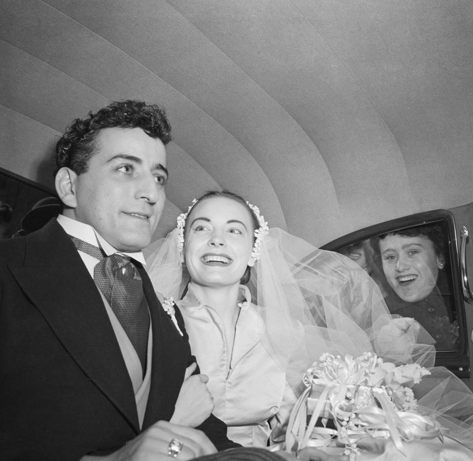 Singer Tony Bennett and his bride Patricia Beech leaving St. Patrick's Cathedral in their wedding car on February 12, 1952 after marrying.