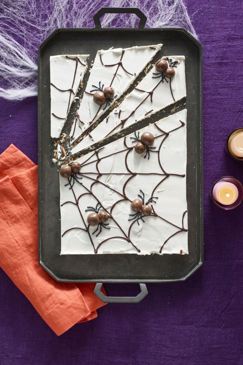 <p>Not even arachnophobes can resist the itsy-bitsy malt-ball creatures topping this delicious white chocolate-covered pretzel web.</p><p><strong><em><a href="https://www.womansday.com/food-recipes/food-drinks/recipes/a60166/candy-cobwebs-recipe/" rel="nofollow noopener" target="_blank" data-ylk="slk:Get the Candy Cobwebs recipe.;elm:context_link;itc:0;sec:content-canvas" class="link ">Get the Candy Cobwebs recipe. </a></em></strong> </p>