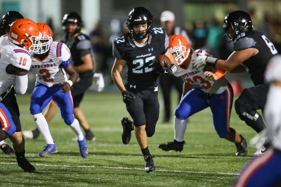 The Gulf Coast Sharks compete against the Cape Coral Seahawks in a spring football game at Gulf Coast High School in Naples on Thursday, May 25, 2023.