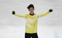 United States' Nathan Chen celebrates after competing in the men's free skating during the figure skating Grand Prix finals at the Palavela ice arena, in Turin, Italy, Saturday, Dec. 7, 2019. (AP Photo/Antonio Calanni)