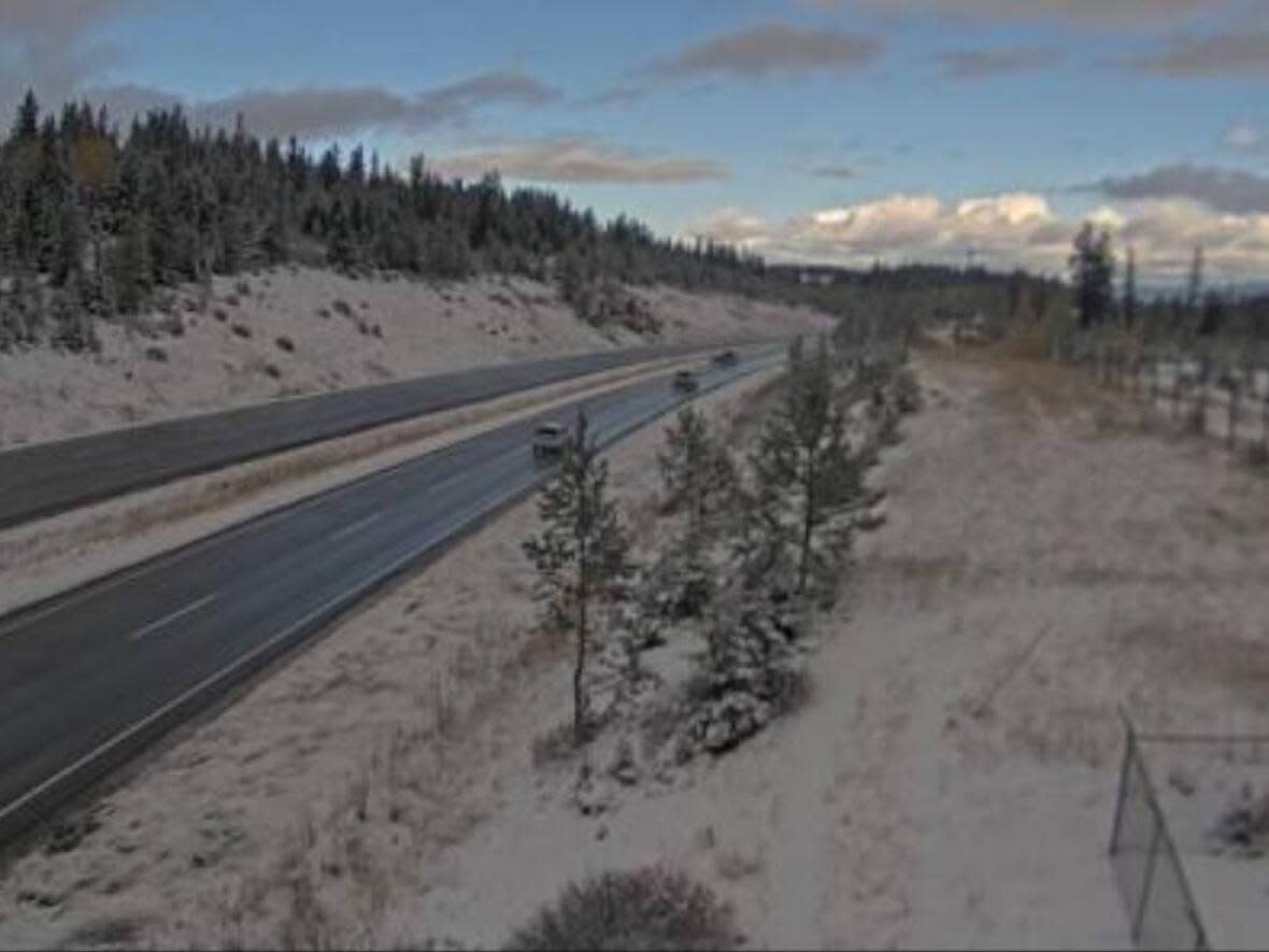 A traffic camera on the Coquihalla, south of Kamloops, shows snow accumulating on the morning of Oct. 10. Environment Canada is warning of snow on most of the province's southern highways. (DriveBC - image credit)