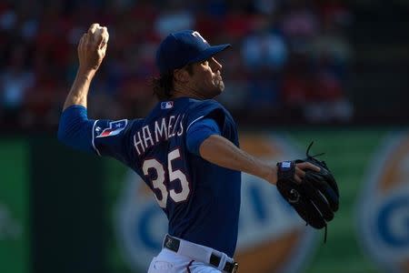 Oct 4, 2015; Arlington, TX, USA; Texas Rangers starting pitcher Cole Hamels (35) pitches against the Los Angeles Angels during the game at Globe Life Park in Arlington. The Texas Rangers defeat the Angels 9-2 and clinch the American League West division. Mandatory Credit: Jerome Miron-USA TODAY Sports