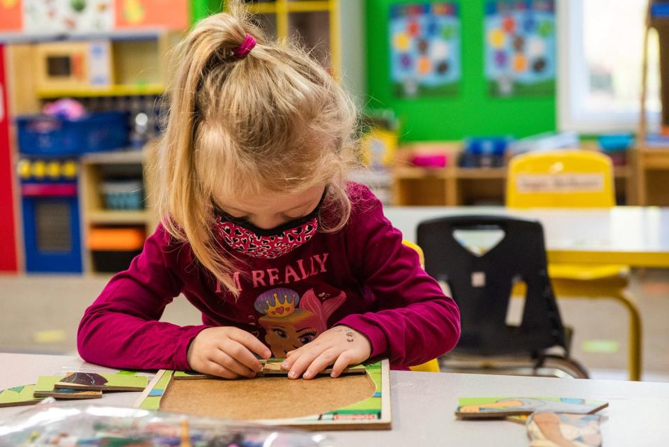 Emilia Santana, 4, plays with a puzzle at Pattycake Playhouse Early Childhood Learning Center in Newburgh, NY on Monday, November 1, 2021. KELLY MARSH/FOR THE TIMES HERALD-RECORD