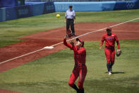 United States' Monica Abbott (14) catches a pop up hit by Australia's Leah Parry for an out in the fifth inning of a softball game at the 2020 Summer Olympics, Sunday, July 25, 2021, in Yokohama, Japan. (AP Photo/Sue Ogrocki)