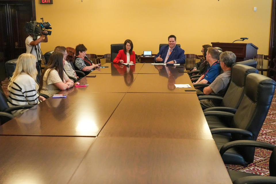  Lt. Gov. Deidre Henderson signs off on the statewide canvass of Utah’s 2024 primary election results at the Utah Capitol on July 22, 2024. (Courtesy of the Utah Lieutenant Governor’s Office)