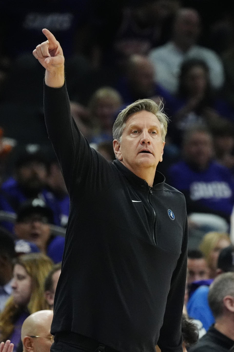 Minnesota Timberwolves head coach Chris Finch directs his players during the second half of Game 4 of an NBA basketball first-round playoff series against the Phoenix Suns, Sunday, April 28, 2024, in Phoenix. The Timberwolves won 122-116, taking the series 4-0. (AP Photo/Ross D. Franklin)