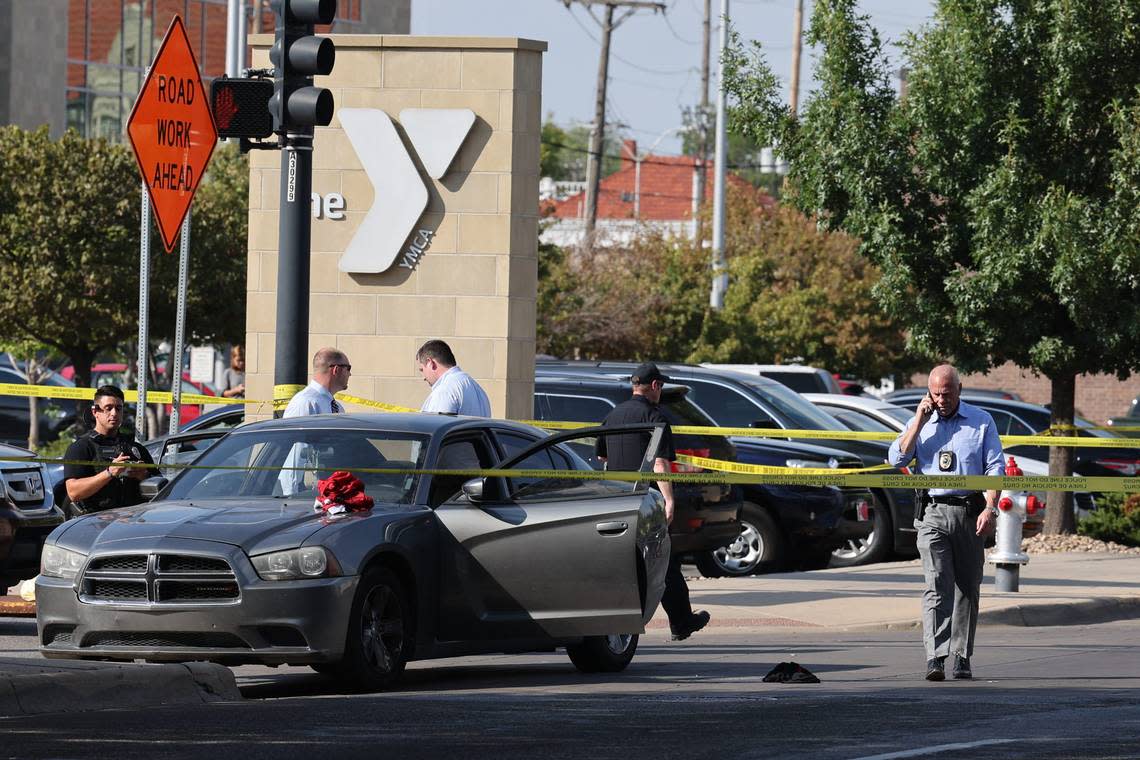 Police investigate a shooting near Third and Broadway on Monday afternoon.