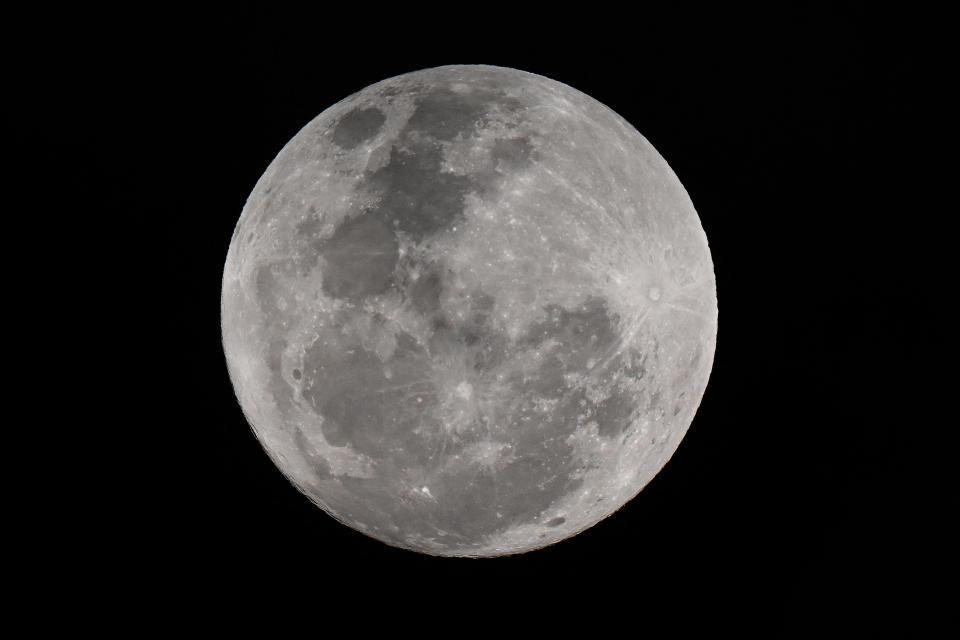 A rare super blue moon appears in the night sky over Sydney on August 19, 2024. / Copyright: SAEED KHAN/AFP via Getty Images