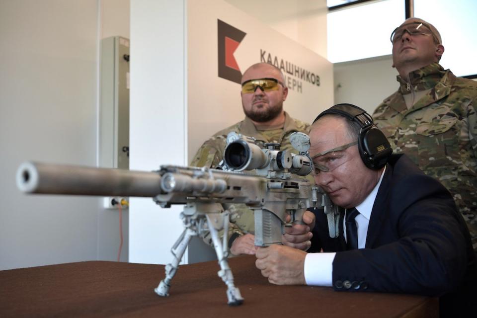 Russian President Vladimir Putin test firing the Chukavin SVCh sniper rifle in September 2018.