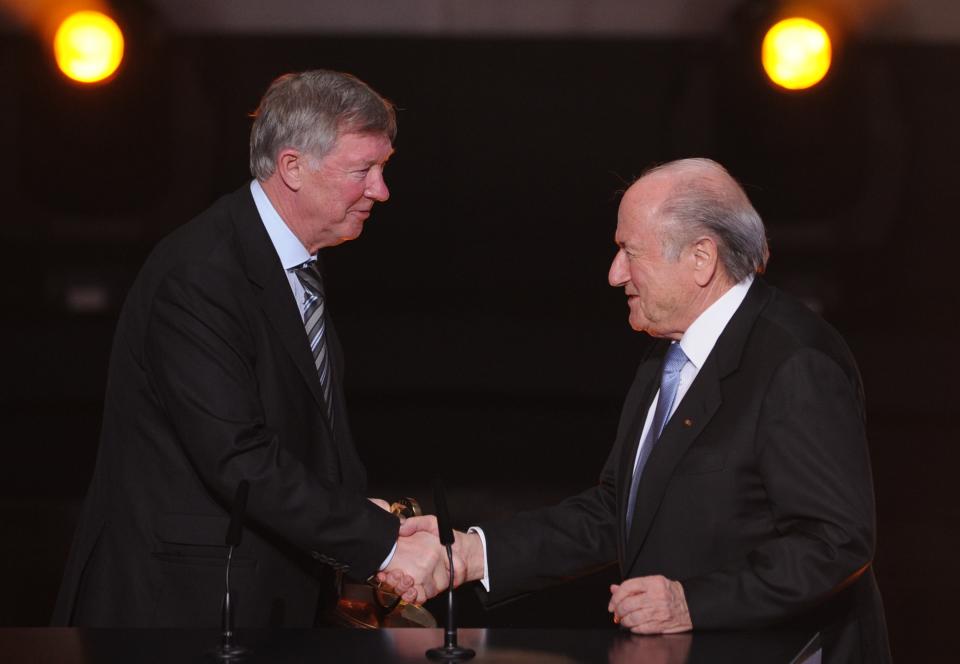 Manchester Uninted British coach Sir Alex Ferguson receives the FIFA Presidential Award from FIFA president Sepp Blatter (R) during the FIFA ballon d'or ceremony on January 9, 2012 at the Kongresshaus in Zurich. AFP PHOTO / FRANCK FIFE (Photo credit should read FRANCK FIFE/AFP via Getty Images)