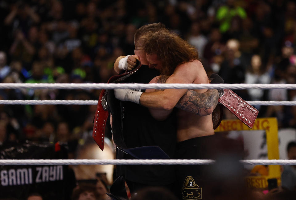 Kevin Owens and Sami Zayn after defeating The Usos for the Undisputed WWE tag team championship during WrestleMania Goes Hollywood at SoFi Stadium on April 01, 2023 in Inglewood, California.