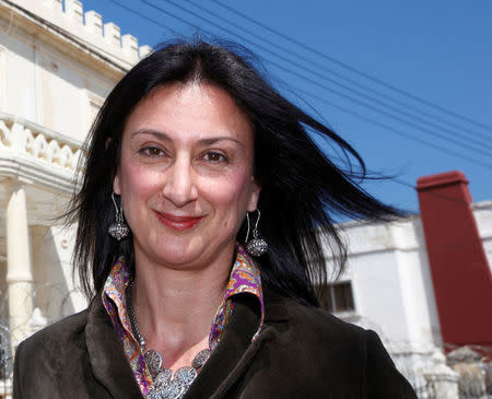 Maltese investigative journalist Daphne Caruana Galizia poses outside the Libyan Embassy in Balzan, Malta April 6, 2011. Picture taken April 6, 2011. REUTERS/Darrin Zammit Lupi