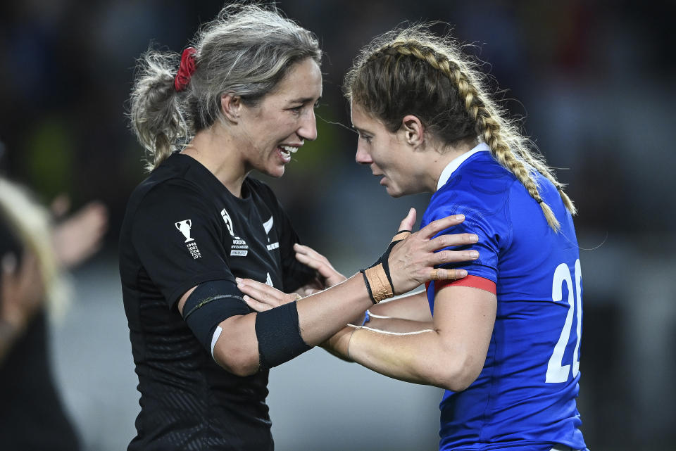 Sarah Hirini, left, of New Zealand and Marjorie Mayans of France talk following the women's rugby World Cup semifinal between New Zealand and France at Eden Park in Auckland, New Zealand, Saturday, Nov.5, 2022. (Andrew Cornaga/Photosport via AP)