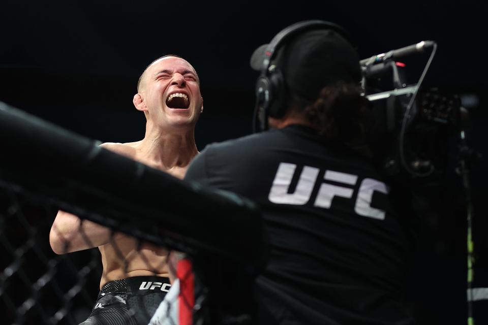 PERTH, AUSTRALIA - AUGUST 18: Kai Kara-France of New Zealand celebrates his victory in his Flyweight bout against Steve Erceg of Australia during UFC 305 at RAC Arena on August 18, 2024 in Perth, Australia. (Photo by Paul Kane/Getty Images)