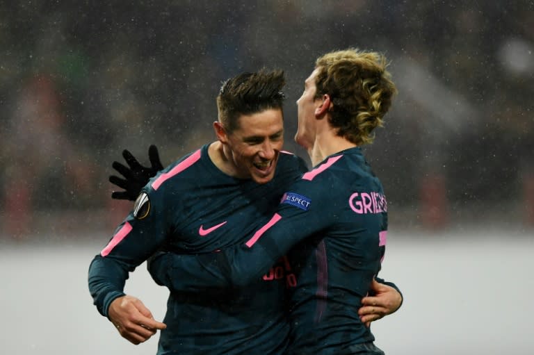 Fernando Torres scored twice, while Antoine Griezmann netted a magnificent strike in Atletico's thrashing of Lokomotiv