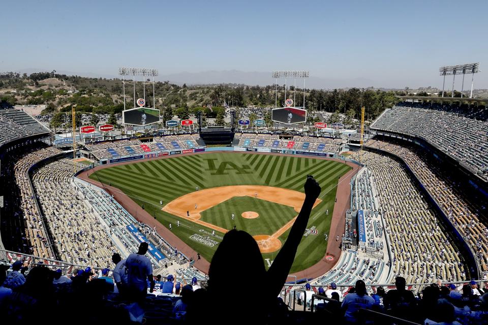 Socially distanced fans attend the Dodgers' home opener on April 9.