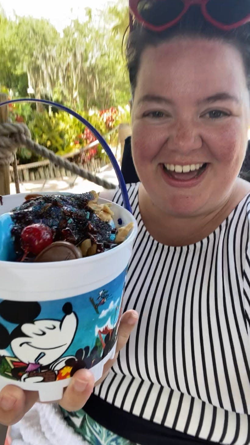 megan holidng birthday cake sundae at typhoon lagoon 