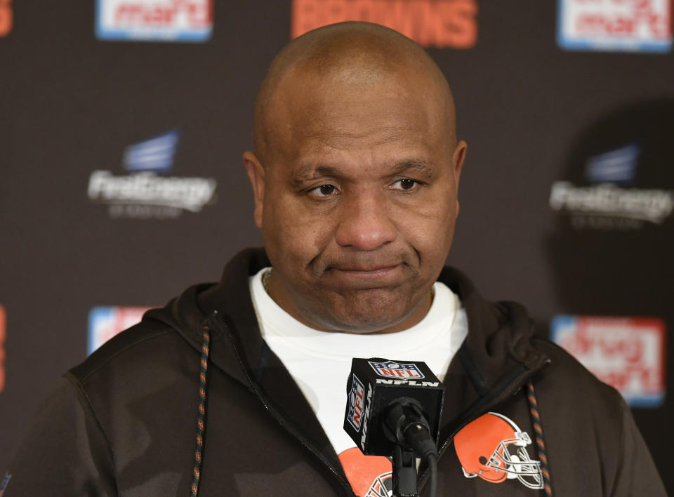 File-This Dec. 10, 2017, file photo shows Cleveland Browns head coach Hue Jackson answering questions during a news conference after in an NFL football game, in Cleveland.  Jackson is confident owner Jimmy Haslam will stick to his plan and bring him back next season. Jackson, who is 0-13 this season and 1-28 in two years with Cleveland, laughed on Monday, Dec. 11, 2017, when asked about a report that new general manager John Dorsey wants to hire his own coach. Dorsey was named the club’s new GM last week by Haslam, who fired vice president of football operations Sashi Brown.(AP Photo/David Richard, File)