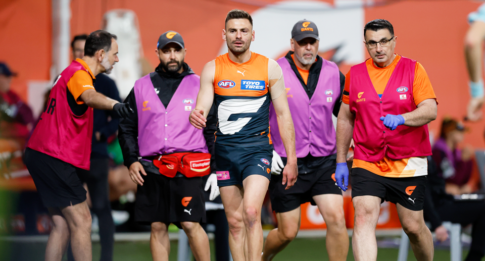 Stephen Coniglio was wiped out of the game after a cheekbone injury in the first quarter as GWS blew a big lead against Brisbane. Pic: Getty