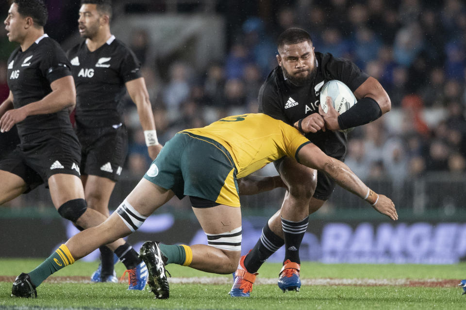 All Blacks prop Nepo Laulala carries the ball against Australia during a Bledisloe Cup rugby test between the All Blacks and Australia at Eden Park in Auckland, New Zealand, Saturday, Aug. 17, 2019. (Brett Phibbs/SNPA via AP)
