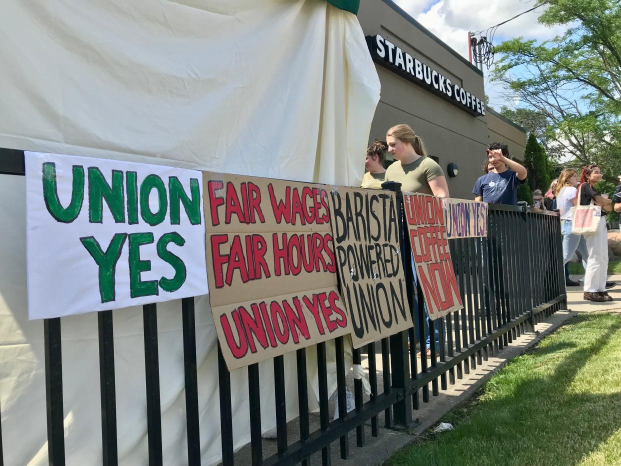 Union support signs hang outside the Starbucks at 1141 E. Grand River Ave. in East Lansing during a union vote count on June 9, 2022.
