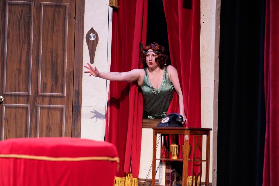 Kori Bielaniec as Florence, the deceased Charles Haversham's fiancee, struggles with a malfunctioning set in "The Play That Goes Wrong" at the Croswell Opera House.