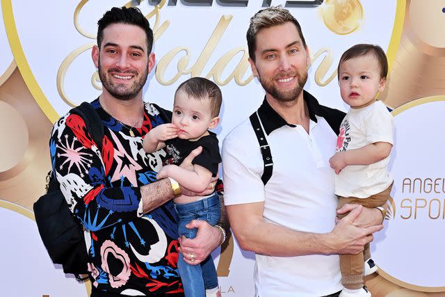 <p>Axelle/Bauer-Griffin/FilmMagic</p> Michael Turchin (left) and Lance Bass with their kids Violet and Alexander in 2023