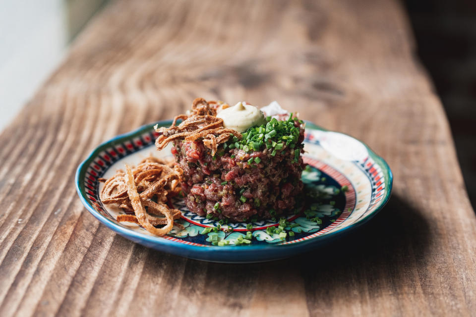Fête's Steak Tartare: Kua’aina Ranches beef, Mahiki veal, béarnaise aioli, crispy shallots, chives, and toast with anchovy butter. (Sean Marrs)